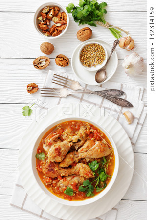 Chakhokhbili, Georgian chicken stew in a bowl Chakhokhbili, Georgian chicken stew in a bowl 132314159
