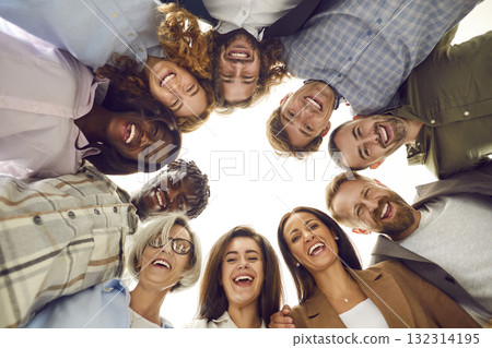 Diverse team of happy smiling business people and friends huddling and having fun 132314195