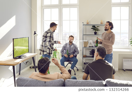 Male friends meet on the weekend, drink beer, watch soccer, and tell funny jokes Male friends meet on the weekend, drink beer, watch soccer, and tell funny jokes 132314266