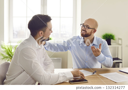 Two happy business men, colleagues and friends, meet, talk and support each other 132314277