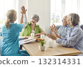 A nurse in a nursing home communication with elderly people, close-up 132314331