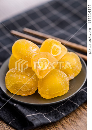 Japanese mochi dessert on plate on wooden table. 132314365