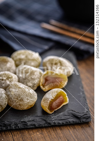 Japanese mochi dessert on plate on wooden table. 132314366