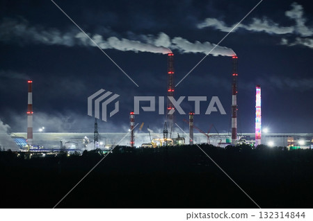 Night industrial landscape: smoke from factory chimneys. Environmental pollution. Night industrial landscape: smoke from factory chimneys. Environmental pollution. 132314844