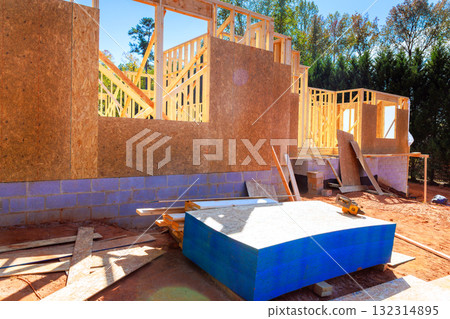 Workers are busy framing beams new house with wooden structures building materials 132314895