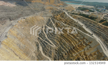 Aerial of open mine and heavy mining equipment Aerial of open mine and heavy mining equipment 132314949