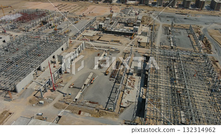 Industrial construction site with construction equipment and materials Industrial construction site with construction equipment and materials 132314962