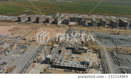 Industrial construction site with construction equipment and materials Industrial construction site with construction equipment and materials 132314964
