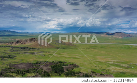 Steppe and mountains with rain landscape Steppe and mountains with rain landscape 132314994