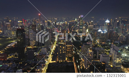 Illuminated skyscrapers and Lumpini park in Bangkok 132315001