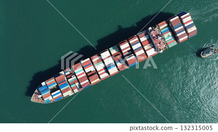 Cargo ship filled with containers in port area 132315005