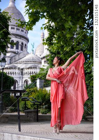 Elegant woman in red dress near Sacre Coeur in Paris Elegant woman in red dress near Sacre Coeur in Paris 132315148