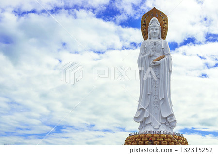 The Guanyin statue on Hainan Island, China. A majestic Buddhist monument by the sea The Guanyin statue on Hainan Island, China. A majestic Buddhist monument by the sea 132315252