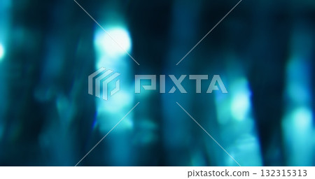 Blur radiant reflection. Abstract flare. Illuminated blue color cold optical lens glisten texture on shiny luminous bokeh light art background. Blur radiant reflection. Abstract flare. Illuminated blue color cold optical lens glisten texture on shiny luminous bokeh light art background. 132315313