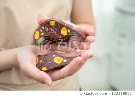 Cirrhosis, Liver cancer, fatty liver, Asian women with liver human anatomy model in World Hepatitis Day. 132319095