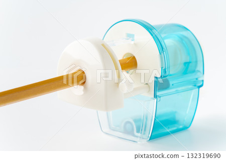 Pencil and light blue pencil sharpener 132319690