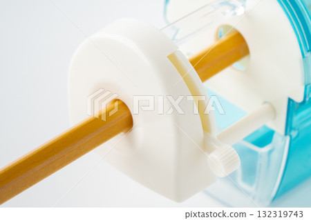 Close-up of a pencil in a pencil sharpener 132319743