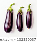 Three Fresh Eggplants on White Background A Culinary Delight and Healthy Eating Concept 132320037
