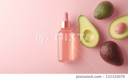 Blank transparent bottle serum liquid with avocado fruit and pink background 132320070
