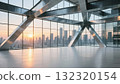The interior space with glass curtain wall and steel structure offers a view of the city skyline 132320154