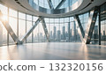 The interior space with glass curtain wall and steel structure offers a view of the city skyline 132320156
