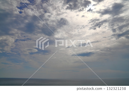 Cloudy sky, sun, sea Cloudy sky, sun, sea 132321238