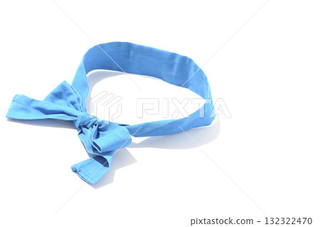 Blue headband photographed against a white background 132322470