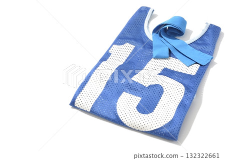 Blue bib and blue headband photographed against a white background 132322661