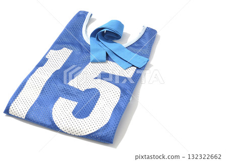 Blue bib and blue headband photographed against a white background 132322662