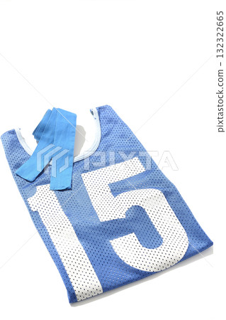 Blue bib and blue headband photographed against a white background Blue bib and blue headband photographed against a white background 132322665