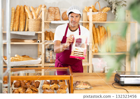 Friendly male baker offers to buy fresh delicious sweet cake 132323456