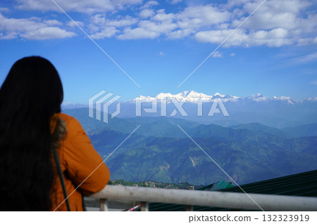 Tourist Viewing Snow Capped Kanchenjunga from Darjeeling Balcony 132323919