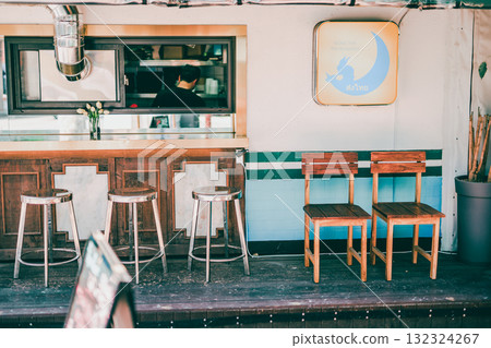 modern workspace architecture design with classic chair and wooden bar at front of shop modern workspace architecture design with classic chair and wooden bar at front of shop 132324267