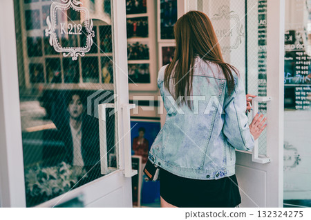 solo woman traveler in jean cloth walk and shopping in the modern city solo woman traveler in jean cloth walk and shopping in the modern city 132324275