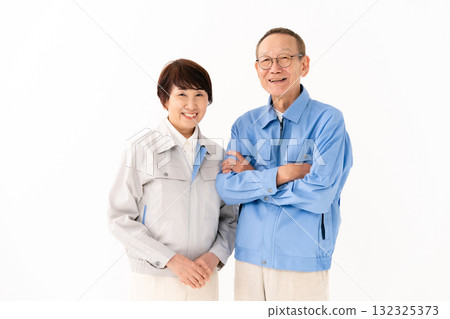 Senior couple in work clothes 132325373