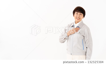 Senior woman in work clothes Senior woman in work clothes 132325384