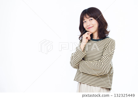 Woman thinking with a smile Woman thinking with a smile 132325449