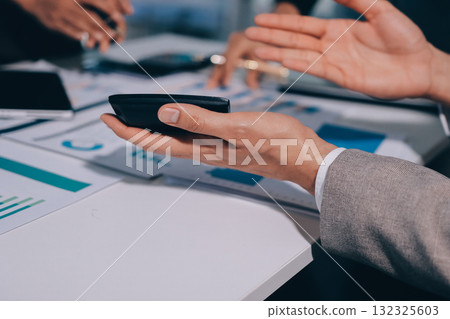Accounting company provide finance and taxation planning for profitable cash flow, Auditor and accountant team working in office, analyze financial data and accounting record with calculator.Insight Accounting company provide finance and taxation planning for profitable cash flow, Auditor and accountant team working in office, analyze financial data and accounting record with calculator.Insight 132325603
