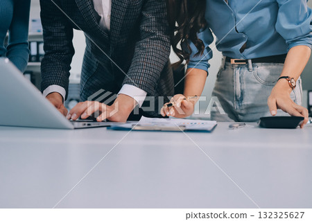 Accounting company provide finance and taxation planning for profitable cash flow, Auditor and accountant team working in office, analyze financial data and accounting record with calculator.Insight 132325627