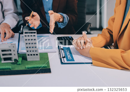 Real estate agent and customer signing contract to buy house, insurance or loan real estate.rent a house,get insurance or loan real estate or property. 132325653