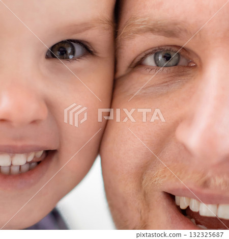 A heartwarming close-up of a father and child smiling, their faces touching, capturing a moment of love and connection. A heartwarming close-up of a father and child smiling, their faces touching, capturing a moment of love and connection. 132325687