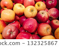 Fresh red apples displayed at farmers market. Variety of shiny edible produce for grocery retail concepts. 132325867