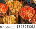 Hanoi, Vietnam - February 17 2021: Traditional Vietnamese illuminated lanterns. Hanging lanterns with floral designs 132325868