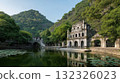Serene Landscape with Historical Architecture and Lush Greenery by Tranquil Water Body 132326023