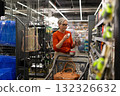 Woman shopping for home supplies in a modern store during the day 132326632
