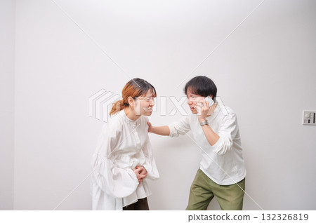 Anxious pregnant woman, phone call, maternity, childbirth Anxious pregnant woman, phone call, maternity, childbirth 132326819