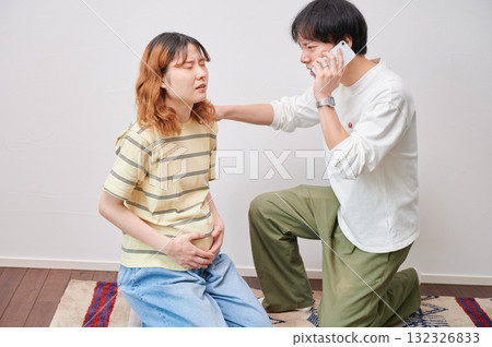 Anxious pregnant woman, phone call, maternity, childbirth Anxious pregnant woman, phone call, maternity, childbirth 132326833