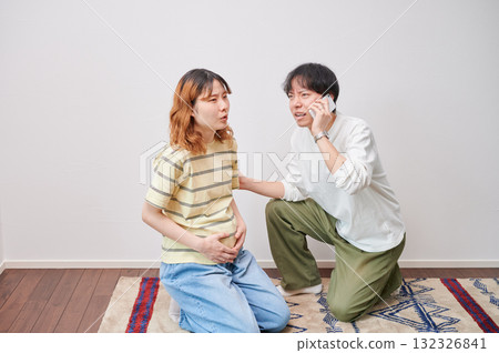 Anxious pregnant woman, phone call, maternity, childbirth Anxious pregnant woman, phone call, maternity, childbirth 132326841