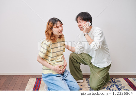 Anxious pregnant woman, phone call, maternity, childbirth Anxious pregnant woman, phone call, maternity, childbirth 132326864