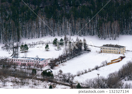A tourist base nestled among the trees in the mountains in winter. 132327134